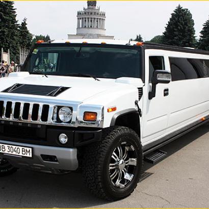 Outdoor view on white Hummer limousine